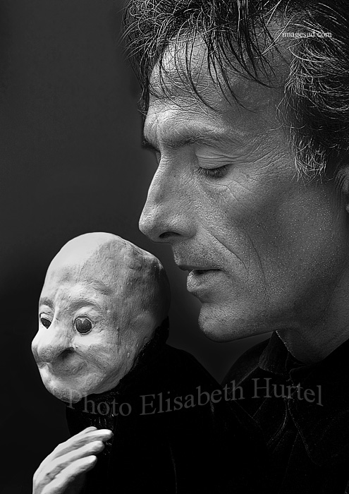 The puppeteer, steet art, portrait black and white